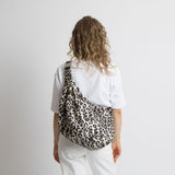 Padded Hip Bag oversized - leo splashes black/sand